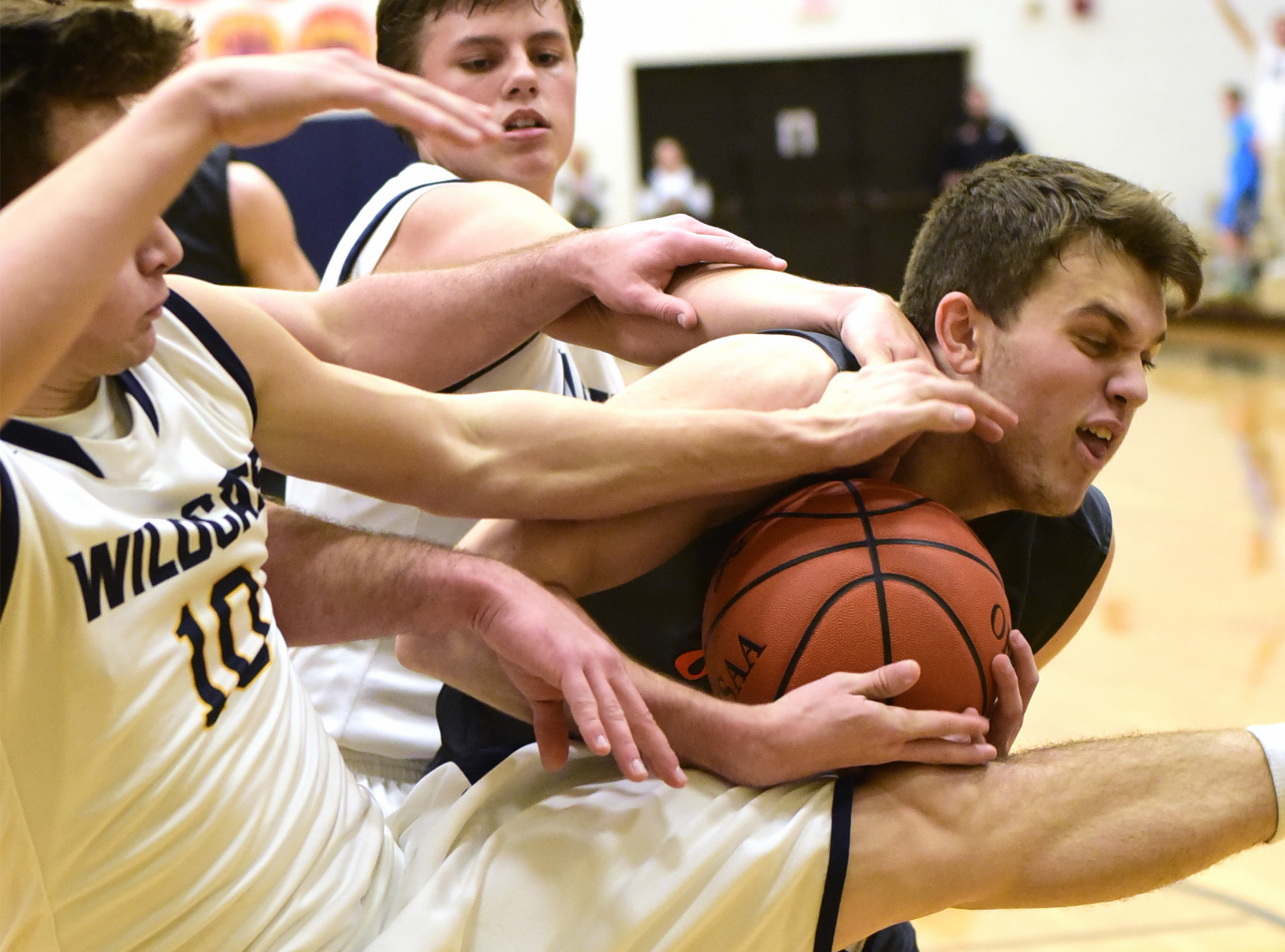 Gibsonburg's Josh Ernsthausen catches a rebound.