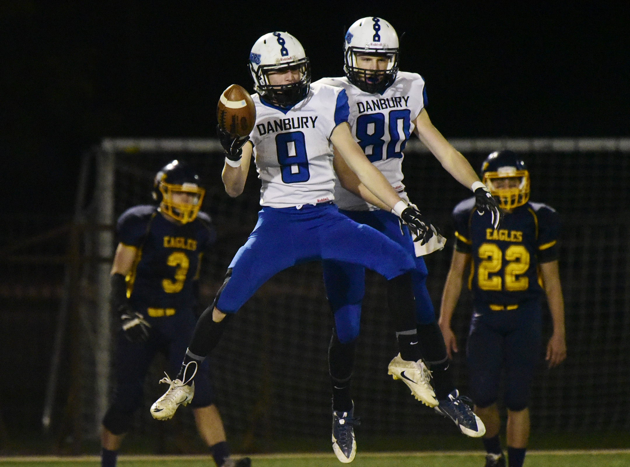 Sam Tyson, left, celebrates scoring a touchdown with Connor McClellan.