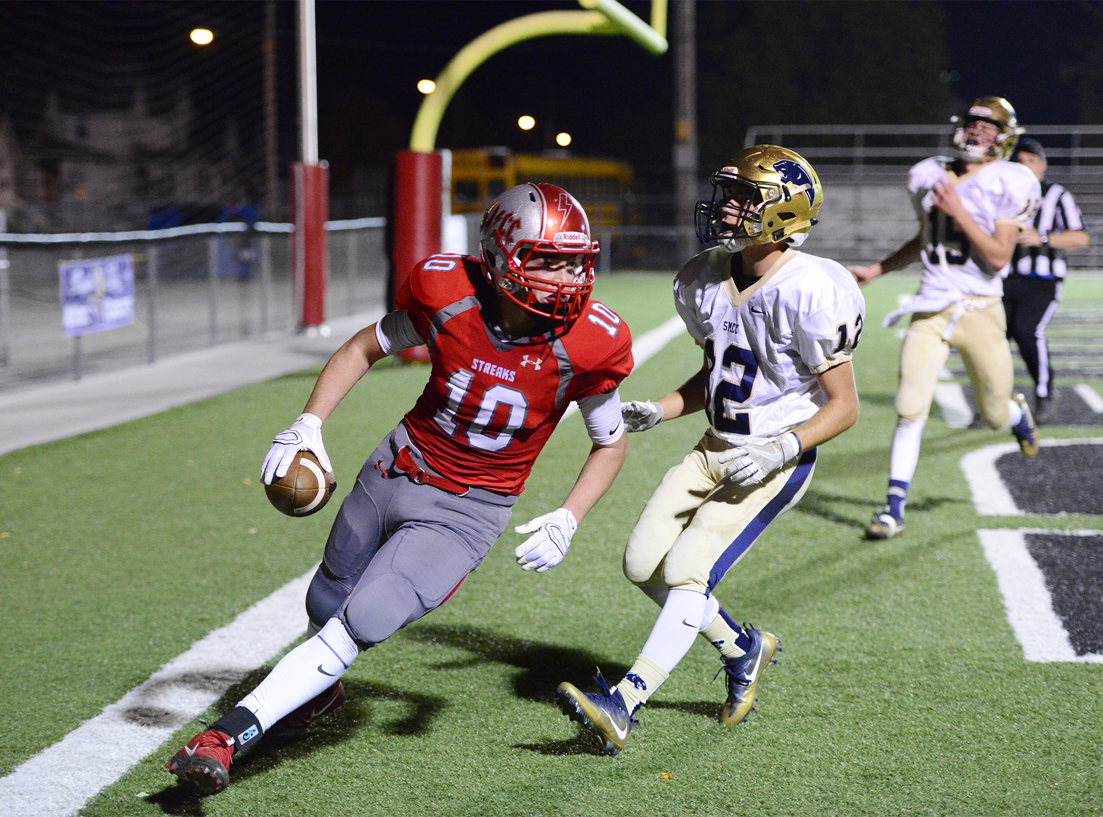 St. Joseph Zach Militello catches a pass for a touchdown against St. Mary.