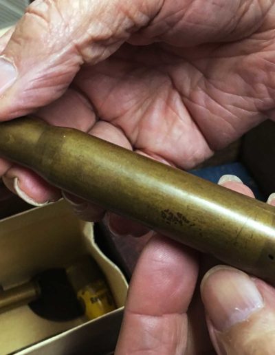 Robert Parman holds a 75 caliber for anti-aircraft shell he kept from his service in World War II.