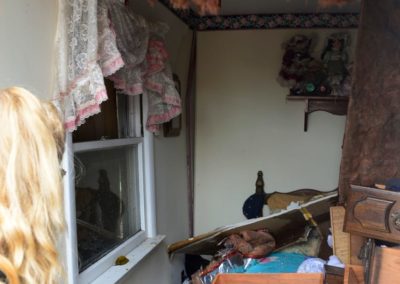 Connie Weyer looks at her bedroom destroyed by a tornado. Every Sunday, the Weyer family eats dinner together. But, on Nov. 5, the family went bowling. “If we were here, my grandkids would have been playing in this room when the tornado hit,” Connie said.
