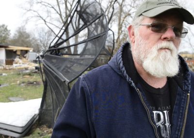 Kevin Weyer said he feels frustrated because he wants to clean up his yard after a tornado hit two weeks ago, but can't until until the insurance company finishes its damage assessment. He has hired a public adjuster to act as a buffer between the insurance company. The family is also waiting on insurance after the barn burned down in a fire five weeks ago destroying five vintage cars.