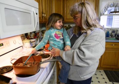 Connie Weber asks her 3-year-old granddaughter, Kaydee Weber, if she was scared when the tornado hit. The family was bowling in Sandusky when the tornado hit the house. Connie said that her granddaughter is too young to understand fully what happened.